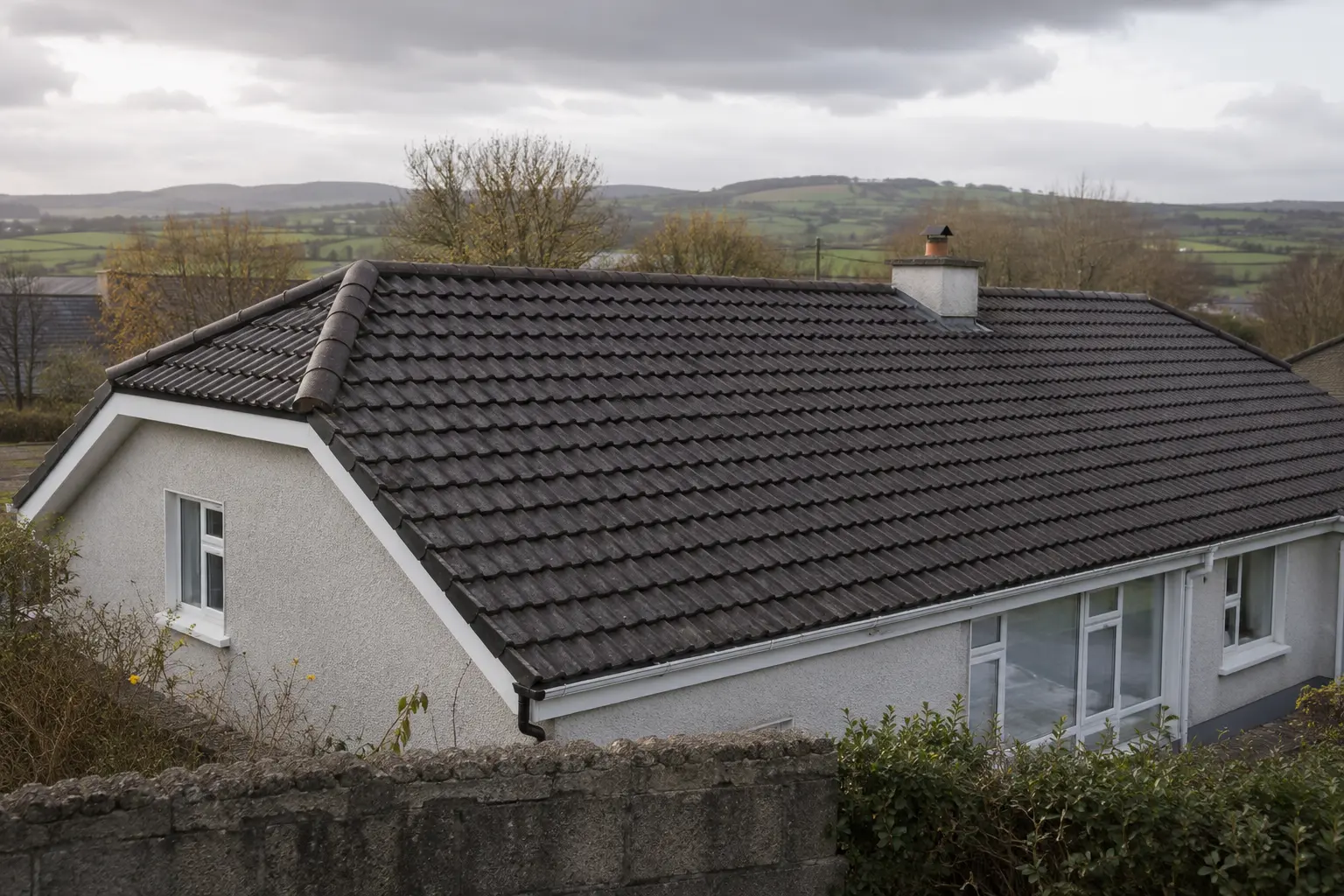 New natural slate beside weathered old slate showing colour difference