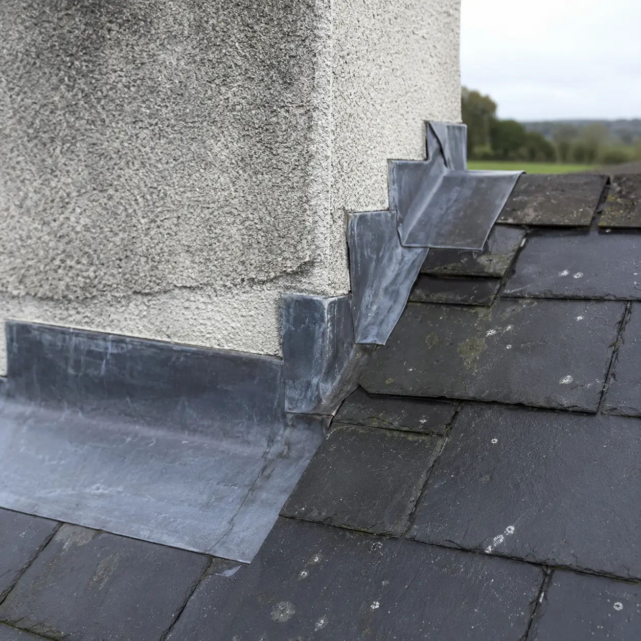 Lead flashing lifting away from a chimney
