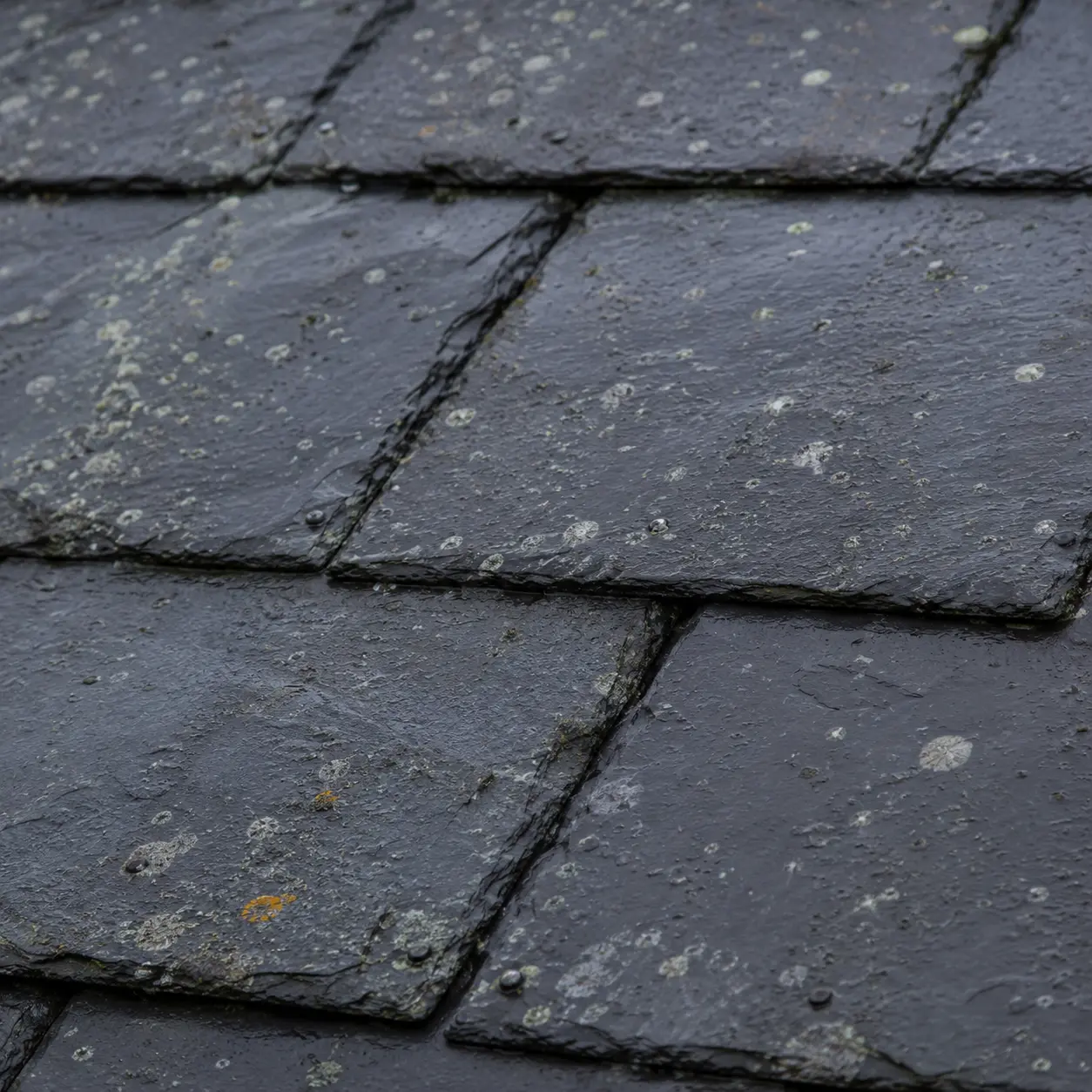 A slate roof and chimney stack on an Irish house