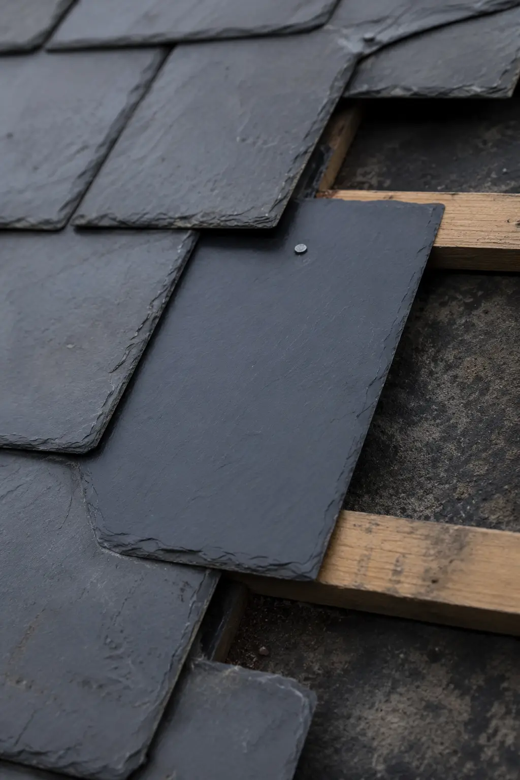 A slipped slate and worn mortar on an Irish roof